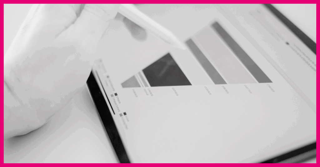 a person navigating a tablet that displays an image of a marketing funnel