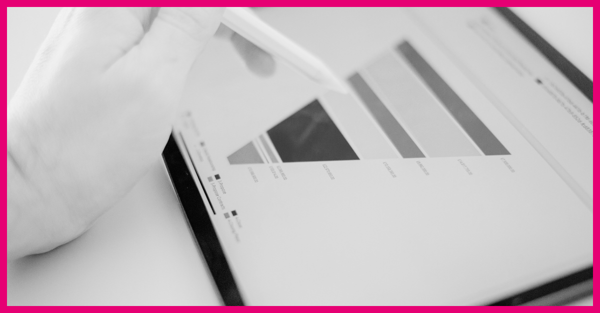 a person navigating a tablet that displays an image of a marketing funnel