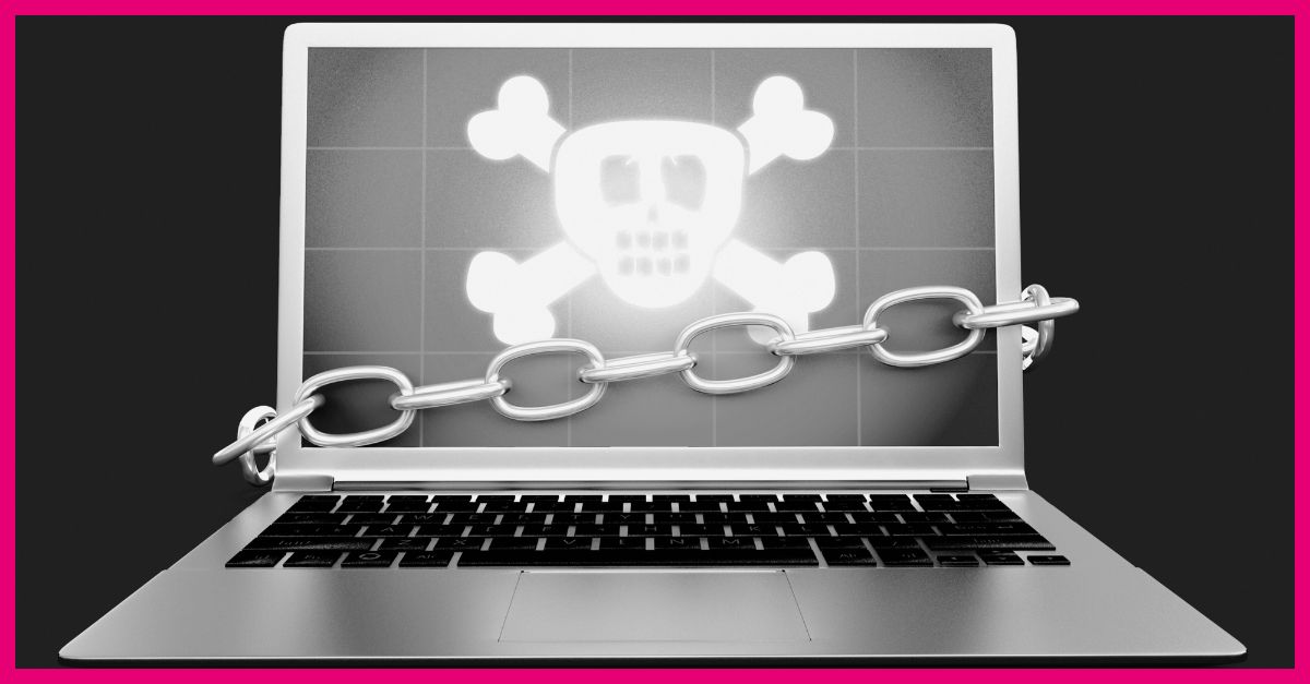 A laptop displaying a skull and chain design, symbolizing a website locked in a custom CMS solution